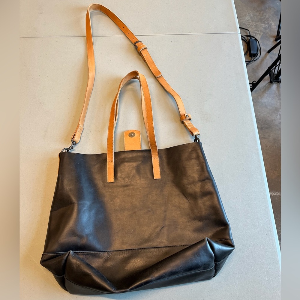 Stylish Black and Tan Leather Tote with Dual Carry Options
